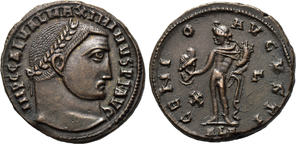 Il Genio dell'augusto e Serapide sul rovescio di questo bellssimo follis alessandrino (g 5,7) del 311-313