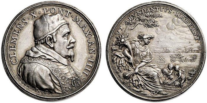 L'Anno Santo 1675 si avvicina e papa Altieri inizia a predisporre le scorte di frumento con ampio anticipo: su questa medaglia in argento (mm 34) Cerere sorveglia il raccolto