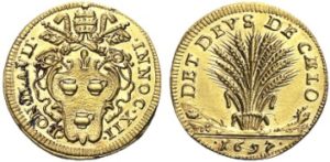 Raro scudo in oro (mm 23) del 1697 di papa Pignatelli con al rovescio un bellissimo fascio di spighe di grano