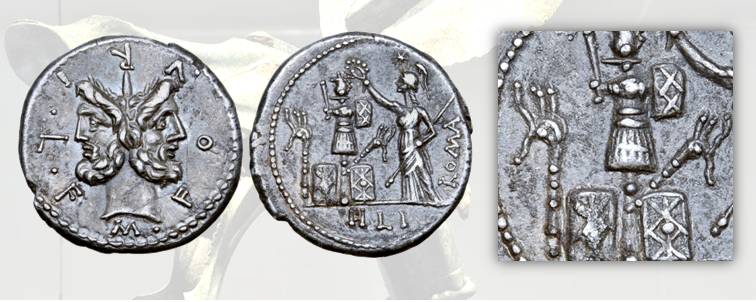 8. Furius Philus, denario romano, 120 a.C, Craw. 281/1. D/ Testa di Giano. R/ La Dea Roma depone una corona sul trofeo di armi celtiche e carnyx