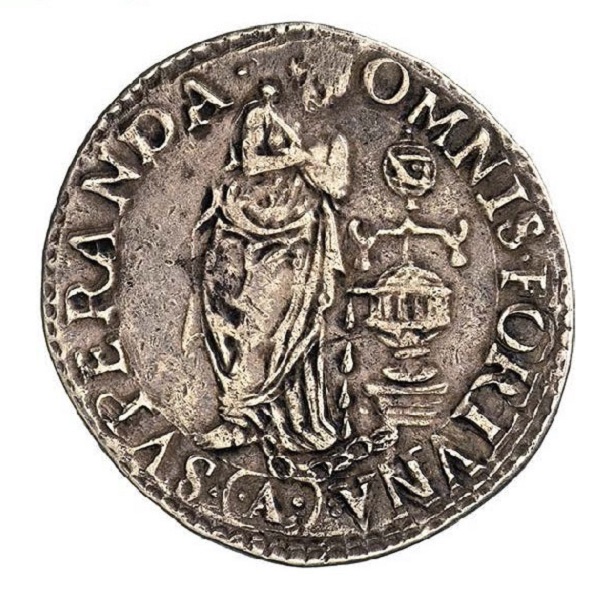 Al rovescio la giovane che simboleggia la virtù della Pazienza ha le braccia incrociate e attende che le gocce consumino le catene che la tengono prigioniera; in alto un giogo e una sfera armillare Al rovescio la giovane che simboleggia la virtù della Pazienza ha le braccia incrociate e attende che le gocce consumino le catene che la tengono prigioniera; in alto un giogo e una sfera armillare