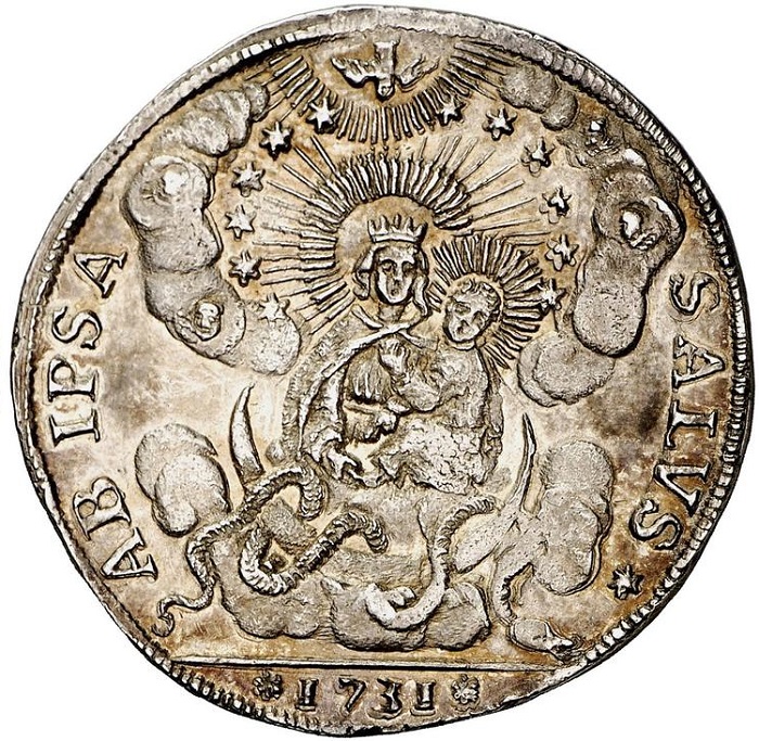 Il rovescio dell'osella veneziana d'argento anno 1731 su cui campeggia un'immagine della Madonna col Bambino ispirata a quella della basilica di Santa Maria della Salute
