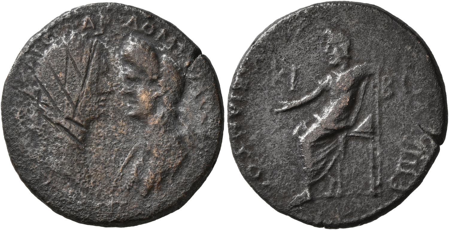 Assarion in rame della zecca di Cybira, nella Phirgia, coniato a nome di Domiziano e Domizia nel periodo 81-96. Il volto di Domiziano appare sfregiato per "damnatio memoriae"