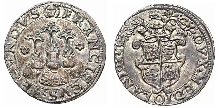 Esemplare da 10 soldi in argento (semprevivo) coniato dalla zecca di Milano durante il ducato di Francesco II Sforza: al dritto le piante con motto tedesco MIT ZAIT ("Col tempo")