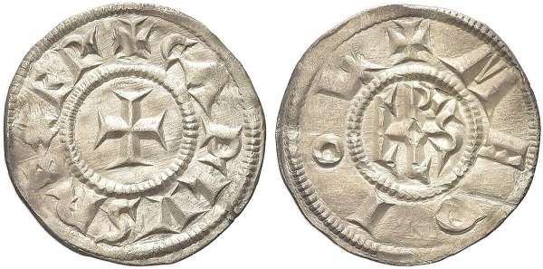Un denaro di Carlo Magno coniato in argento nella zecca di Milano: al rovescio il monogramma dell'imperatore, suo segno distintivo anche nei documenbti ufficiali