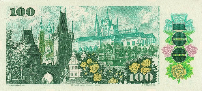 Ideologica al dritto, poetica al rovescio: ecco l'altra faccia delle 100 corone cecoslovacche del 1989 con rose fiorite, uno scorcio del Ponte Carlo e il Castello di Praga che domina dall'alto la scena