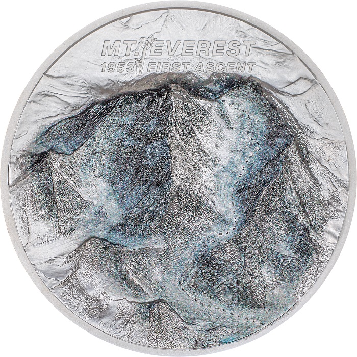 Il rovescio ad altorilievo di entrambe le versioni della moneta riproduce il Monte Everest con sfumature di colore che ricordano l'alternarsi dei ghiacciai e della nuda roccia